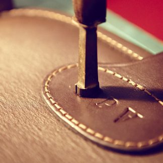 Traditional Hand-Embossing Demonstration with Bill Manley at Purdey